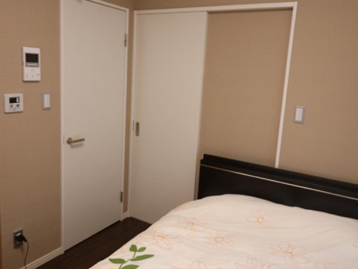 Mr. Kinjo In Makishi Aparthotel Naha Room photo