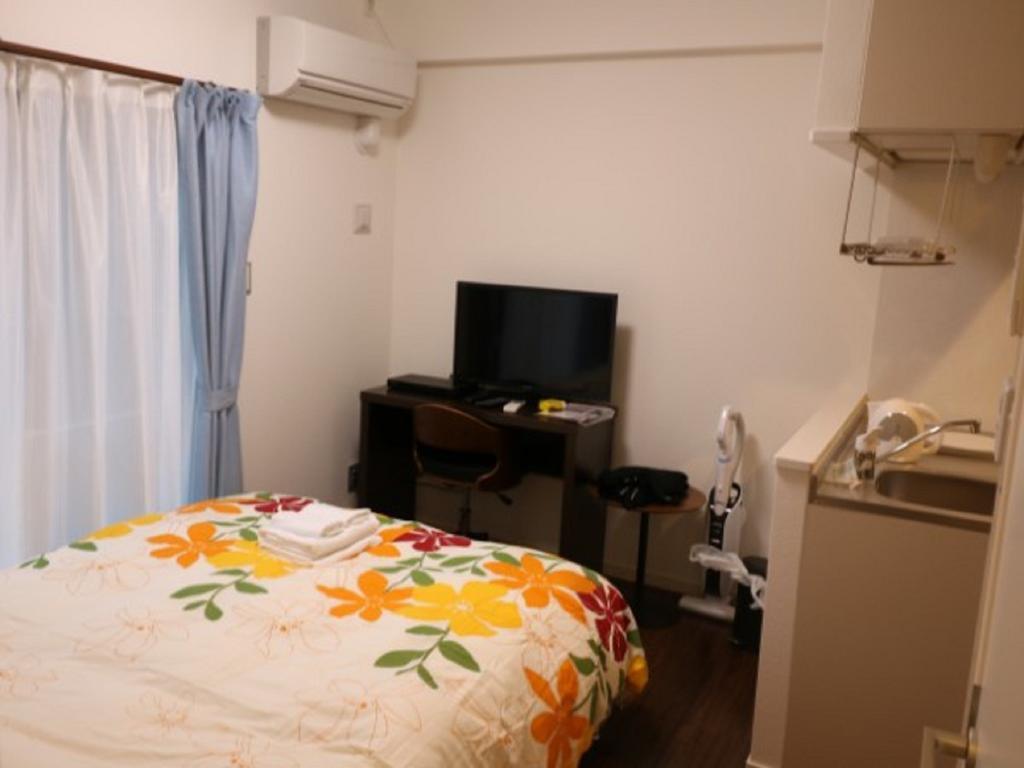 Mr. Kinjo In Makishi Aparthotel Naha Room photo