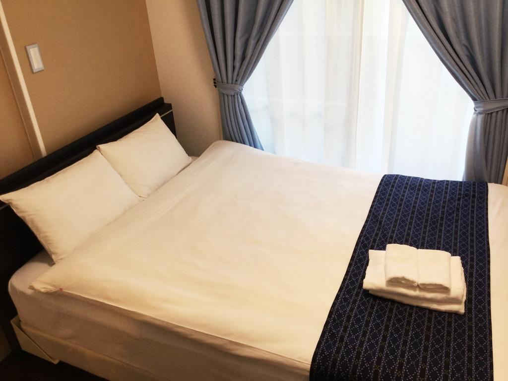 Mr. Kinjo In Makishi Aparthotel Naha Exterior photo